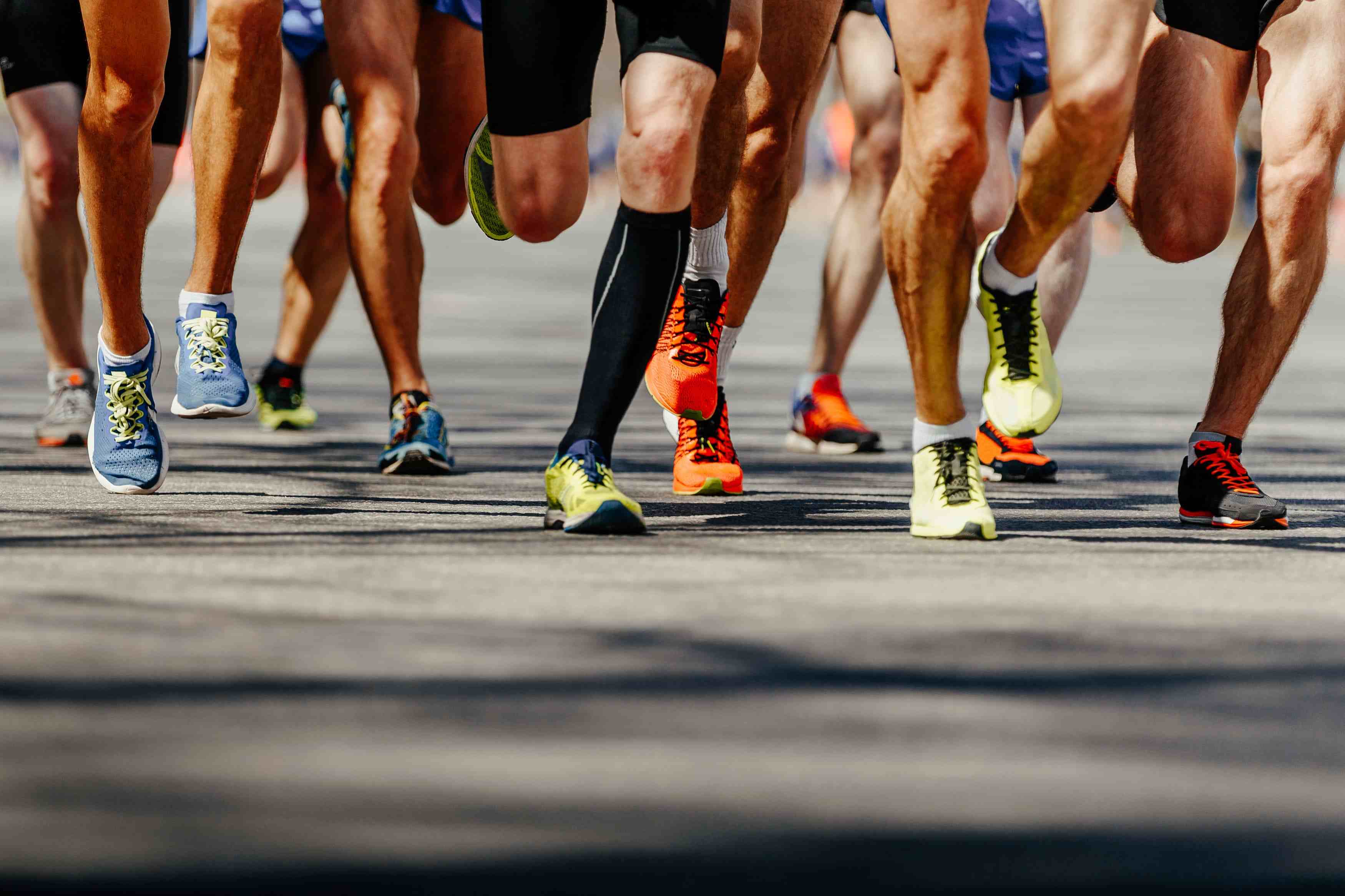 runners-legs-at-a-road-race-in-daylight-2026-01-07-23-52-41-utc runners-legs-at-a-road-race-in-daylight-2026-01-07-23-52-41-utc